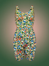 Load image into Gallery viewer, Deadstock floral jersey unitard in front of pink and green ombre background