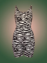 Load image into Gallery viewer, Deadstock black and white zebra print unitard in front of green and pink ombre background