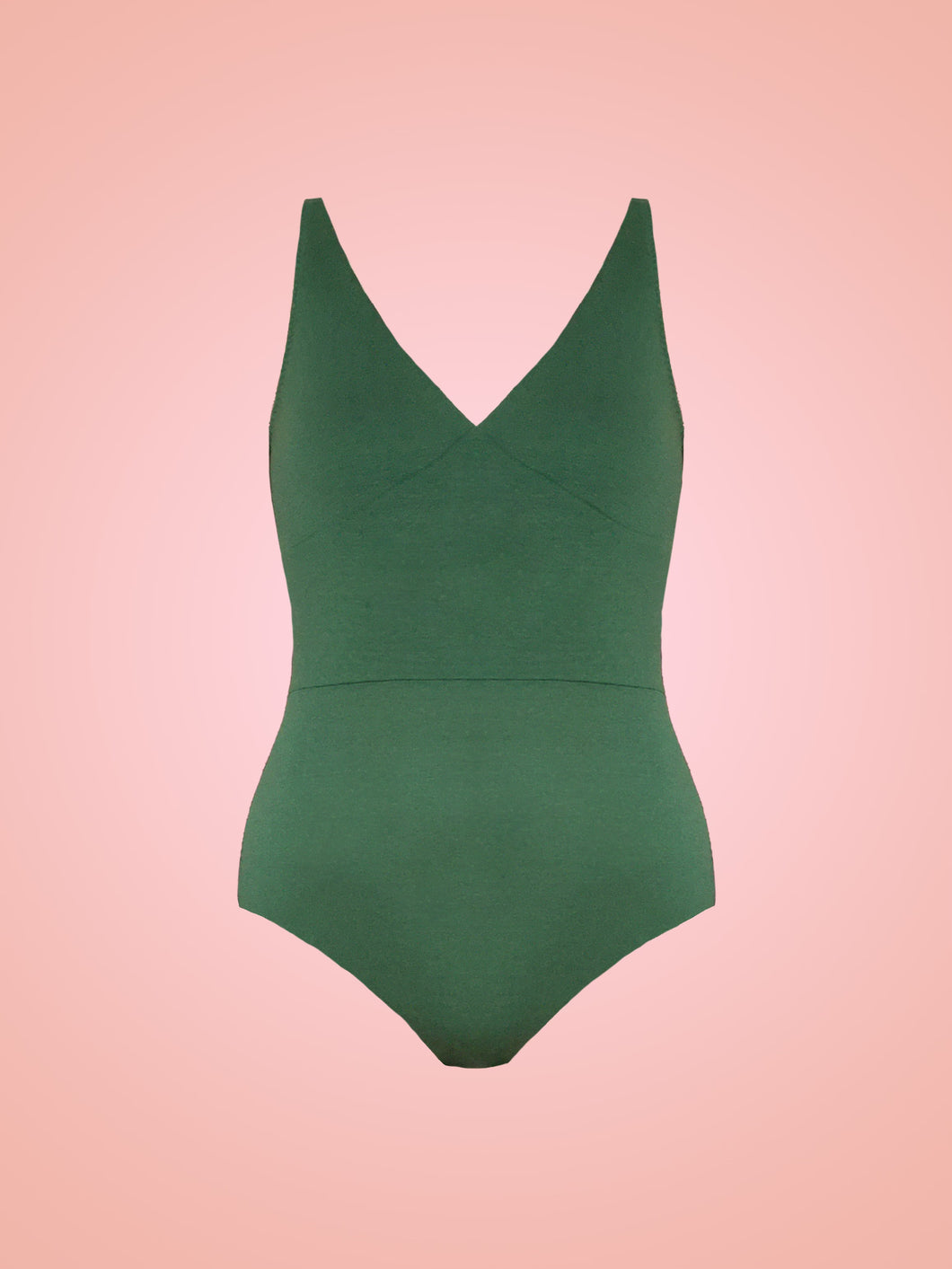 Green Tencel Cleo bodysuit with V neck cups and high waist band in front of pink ombre background